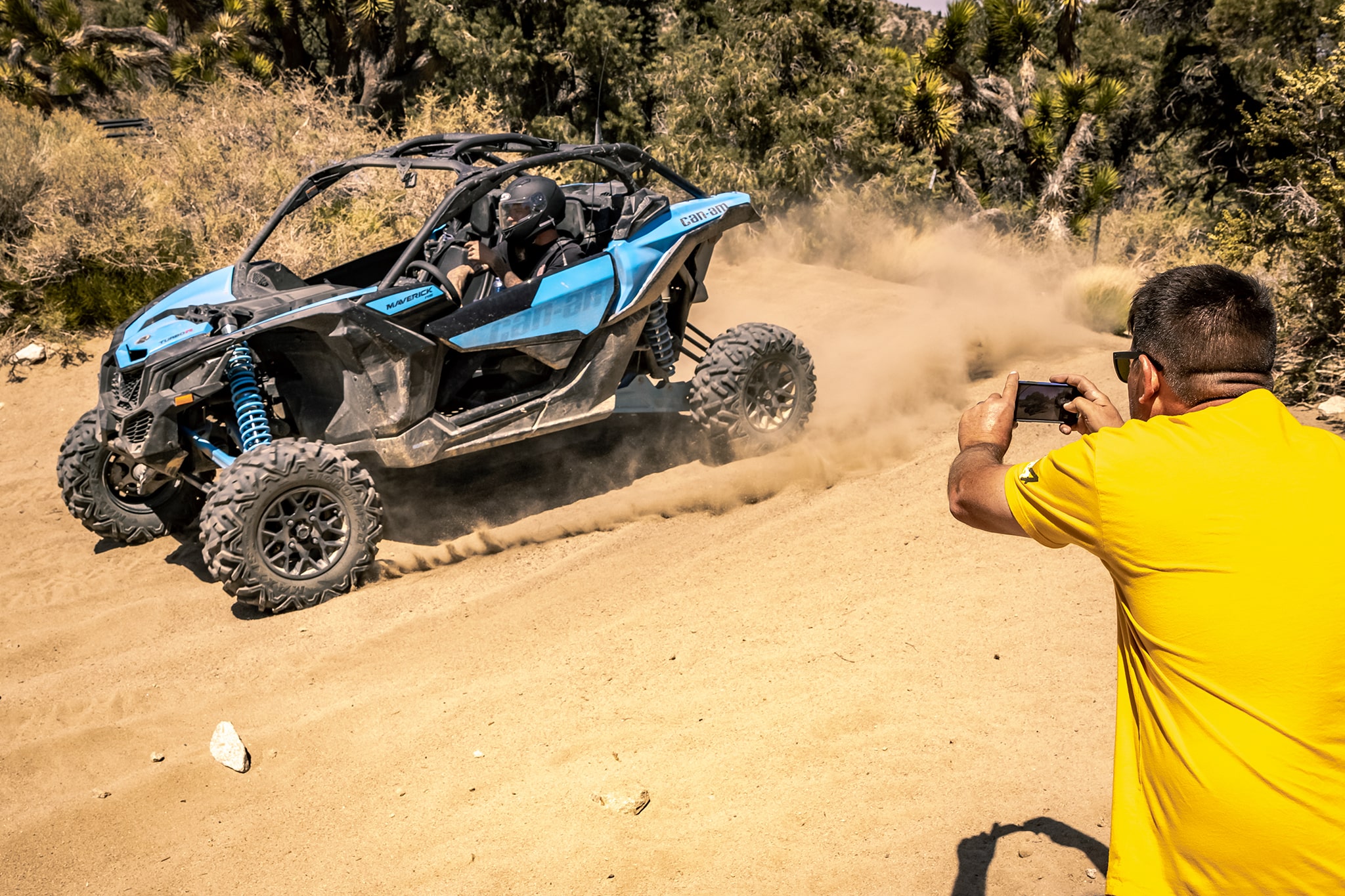 Tour guide taking guest's photo